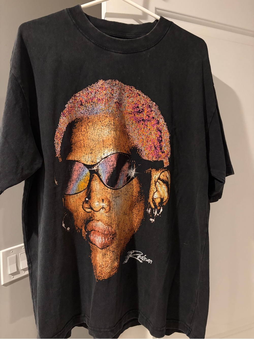 Black Graphic Portrait Wall Art Tee Featuring Colorful Accent